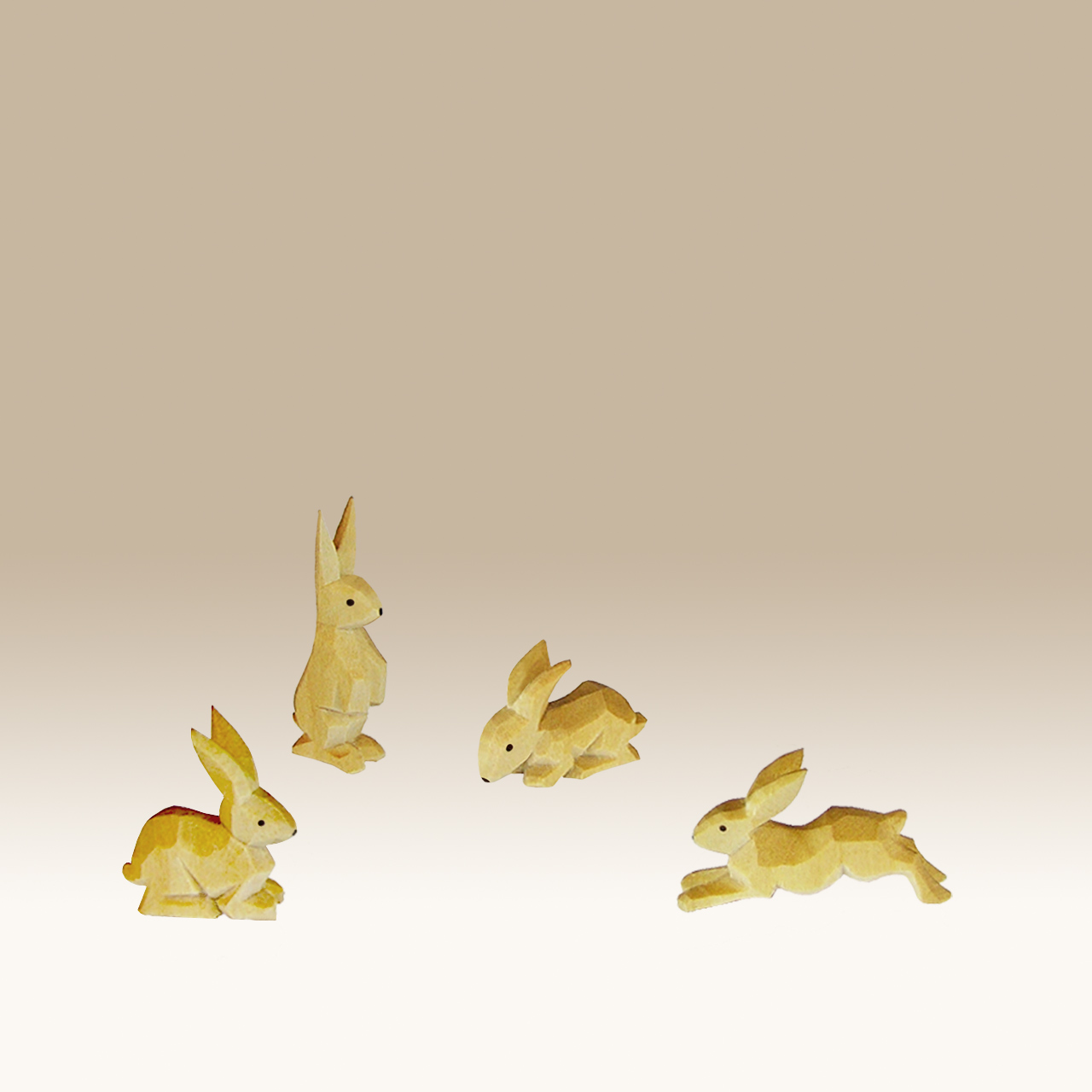 Geschnitzte Hasengruppe