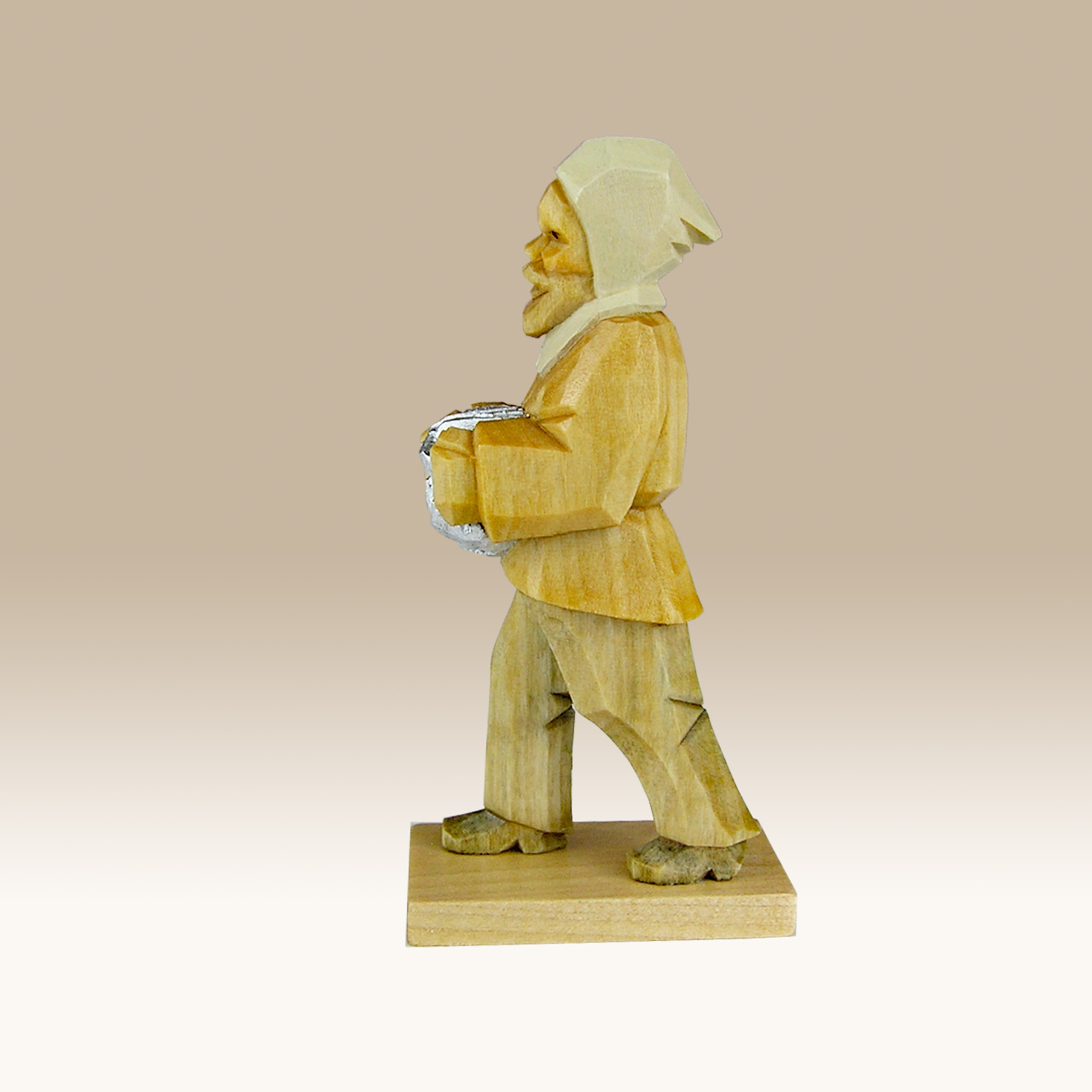 Geschnitzter Bergmann, m. Erzbrocken