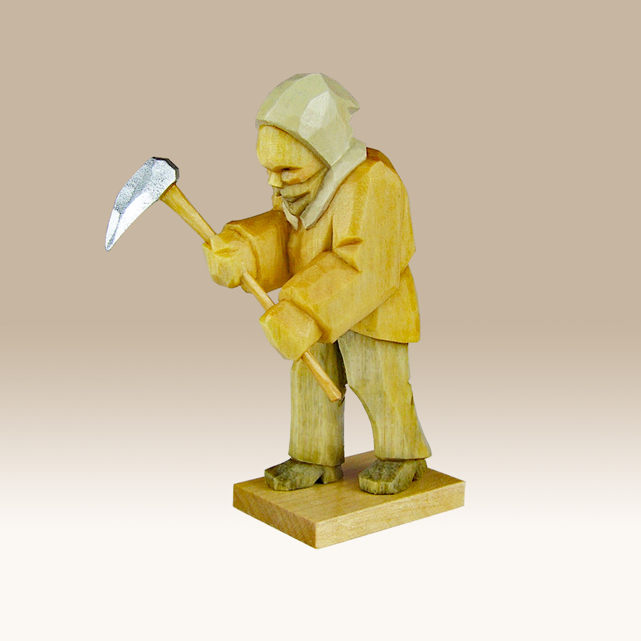 Geschnitzter Bergmann, hackend