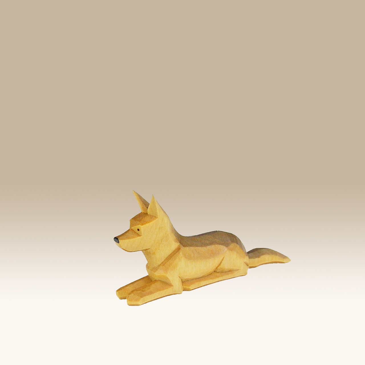 Geschnitzter Schäferhund, liegend