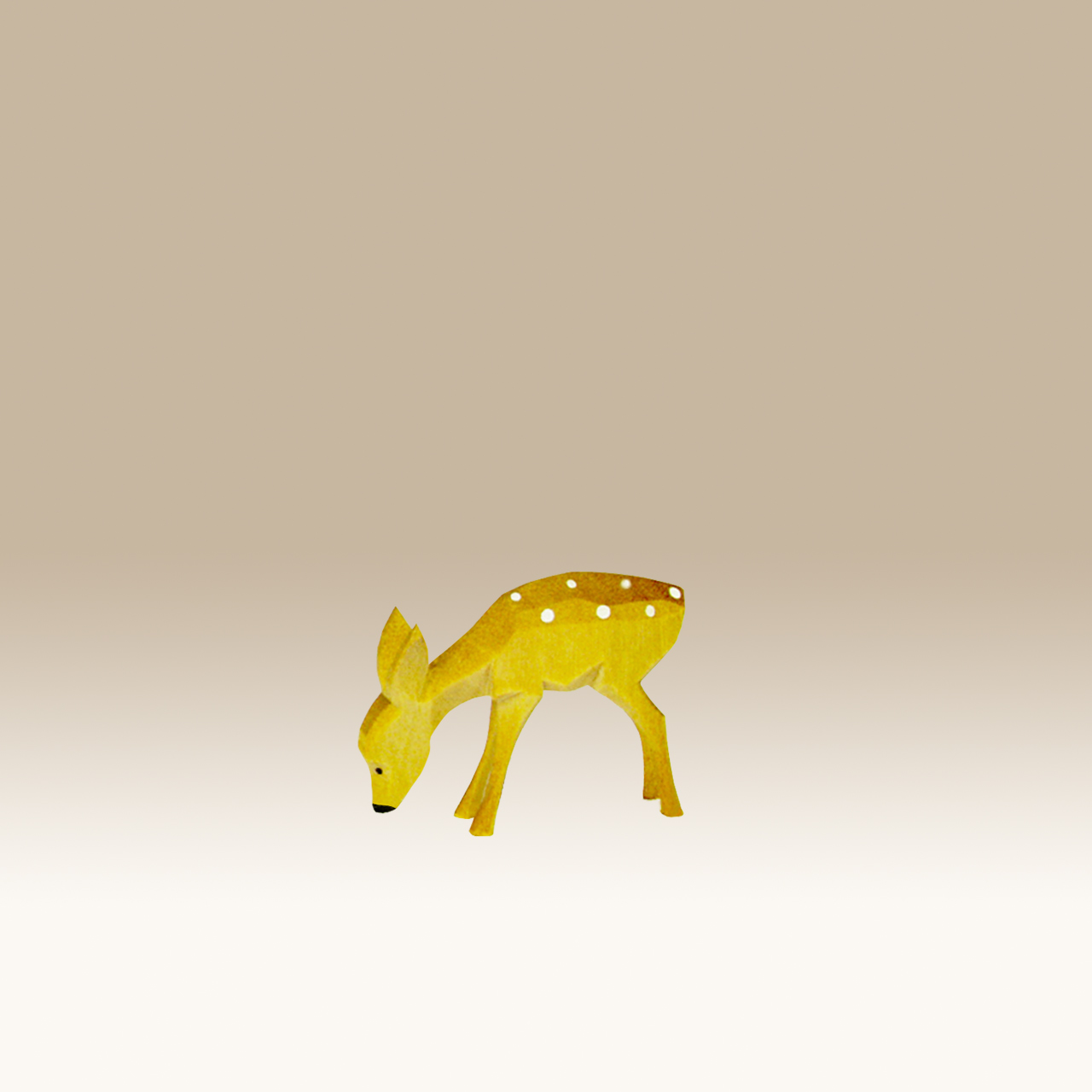 Geschnitztes Kitz, äsend